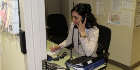 A crisis line worker on the phone