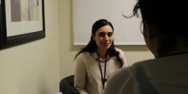 Shirin working as a counsellor
