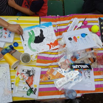 a table covered with art supplies